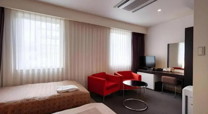 Bed in Hotel Yuquesta Asahibashi Bed in Hotel Yuquesta Asahibashi