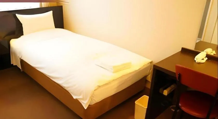 Bed in Hotel The Grand Court Matsusaka