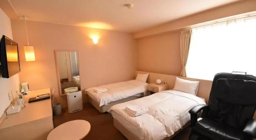 Bed in Hotel The Grand Court Matsusaka