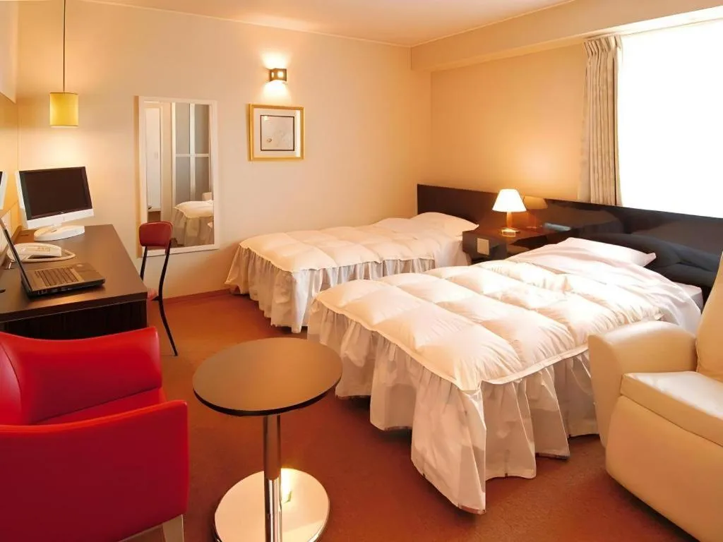 Bed in Hotel The Grand Court Matsusaka