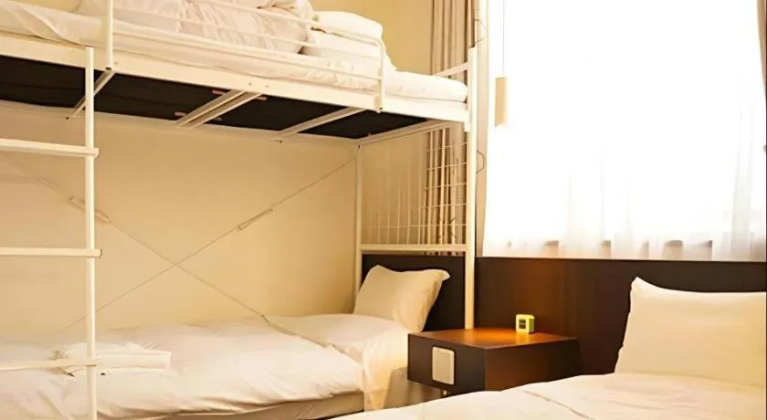 Bed in Hotel The Grand Court Matsusaka