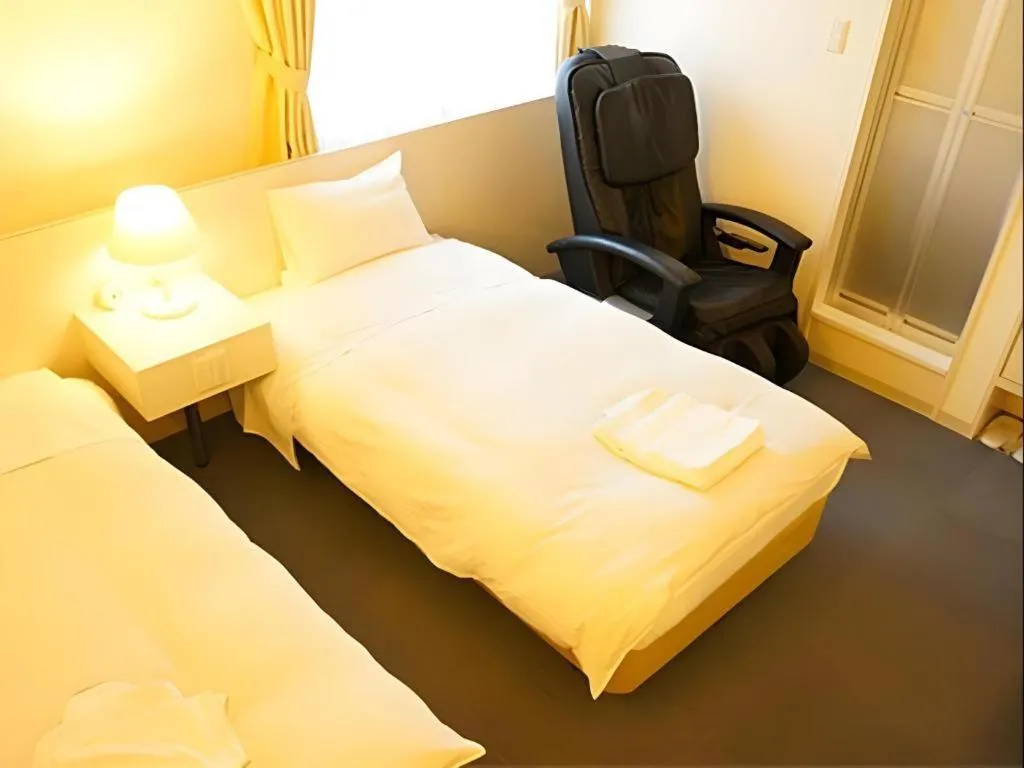 Bed in Hotel The Grand Court Matsusaka