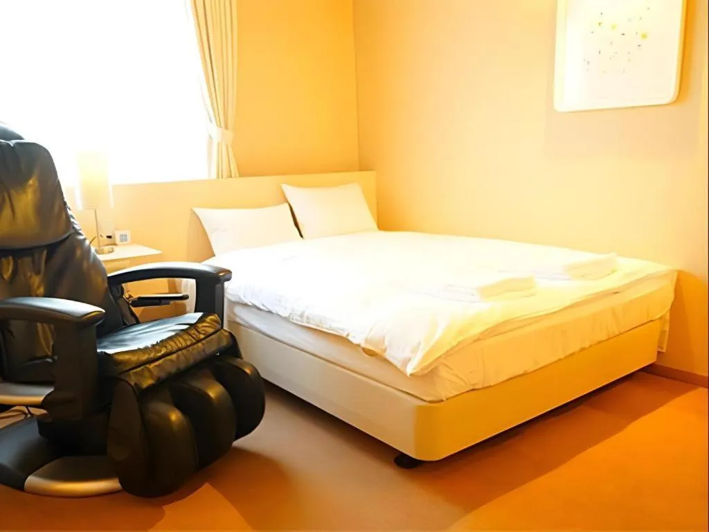 Bed in Hotel The Grand Court Matsusaka