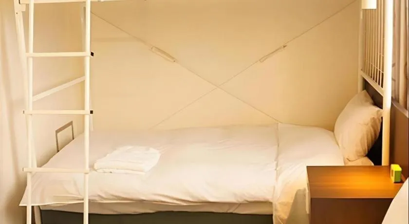 Bed in Hotel The Grand Court Matsusaka