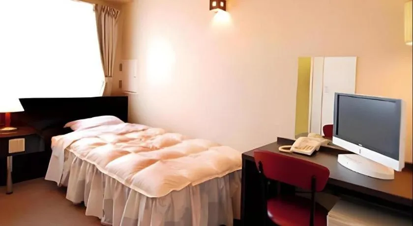 Bed in Hotel The Grand Court Matsusaka