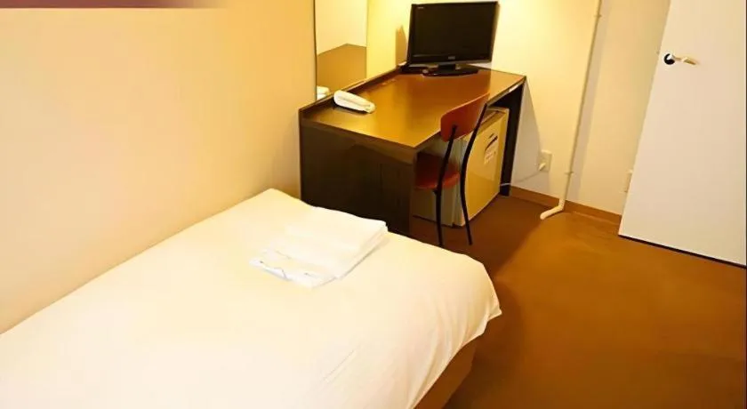 Bed in Hotel The Grand Court Matsusaka