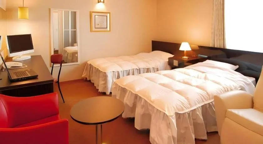 Bed in Hotel The Grand Court Matsusaka