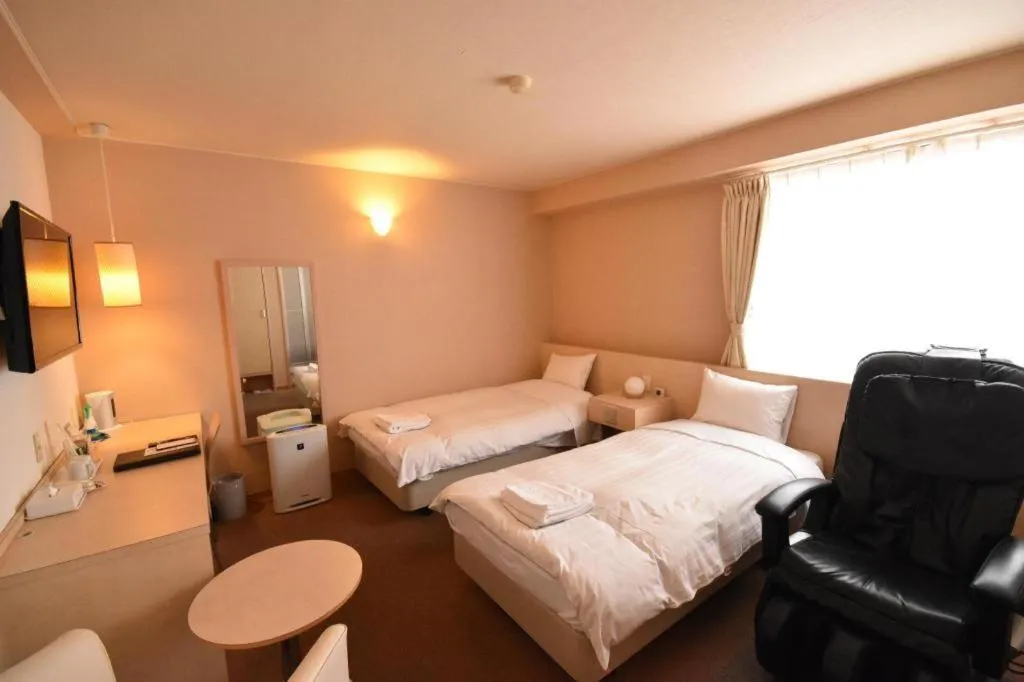 Bed in Hotel The Grand Court Matsusaka