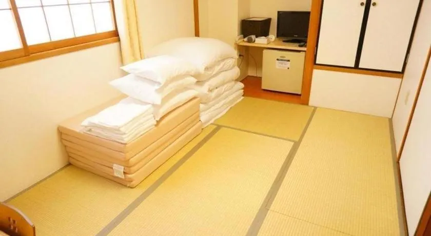 Bed in Hotel The Grand Court Matsusaka