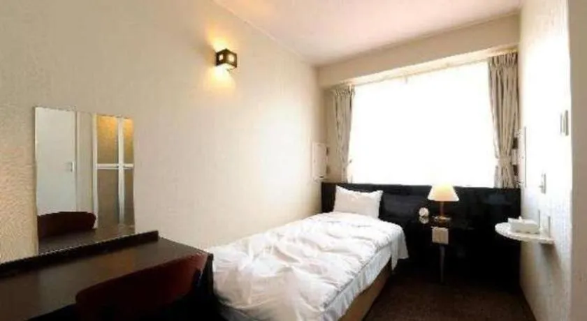 Bed in Hotel The Grand Court Matsusaka