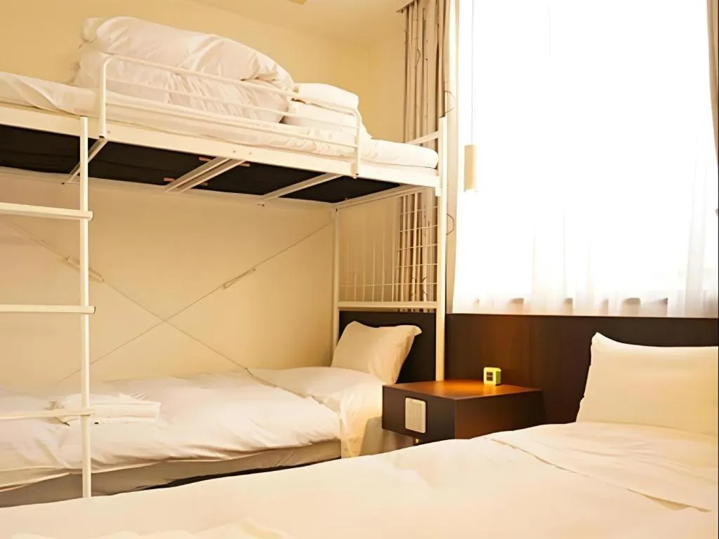 Bed in Hotel The Grand Court Matsusaka