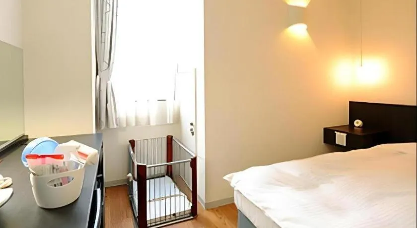 Bed in Hotel The Grand Court Matsusaka