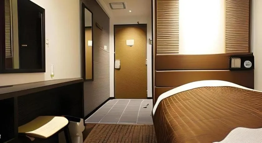 Bed in Mizue Dai-ichi Hotel