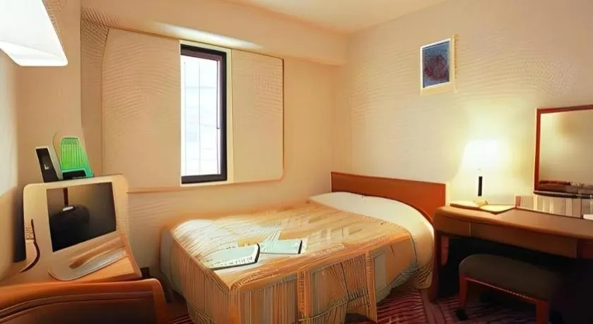 Bed in Mizue Dai-ichi Hotel