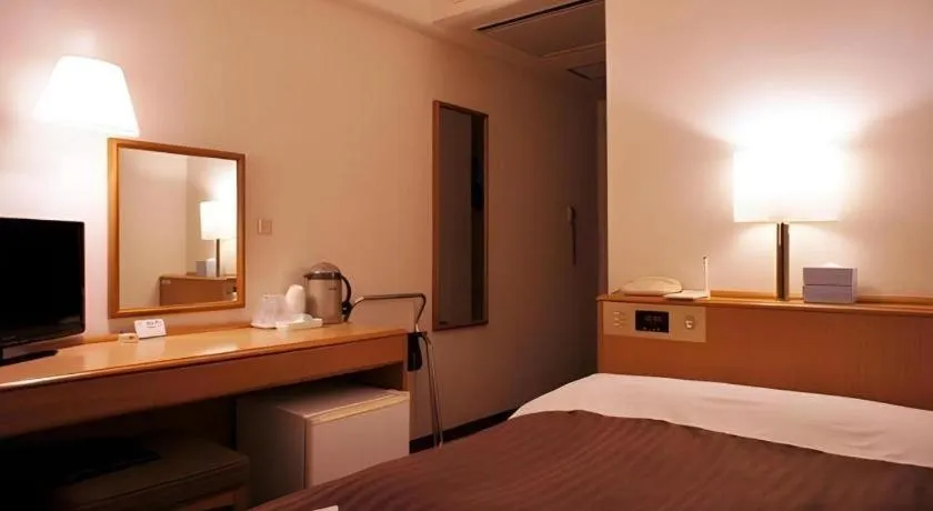 Bed in Mizue Dai-ichi Hotel