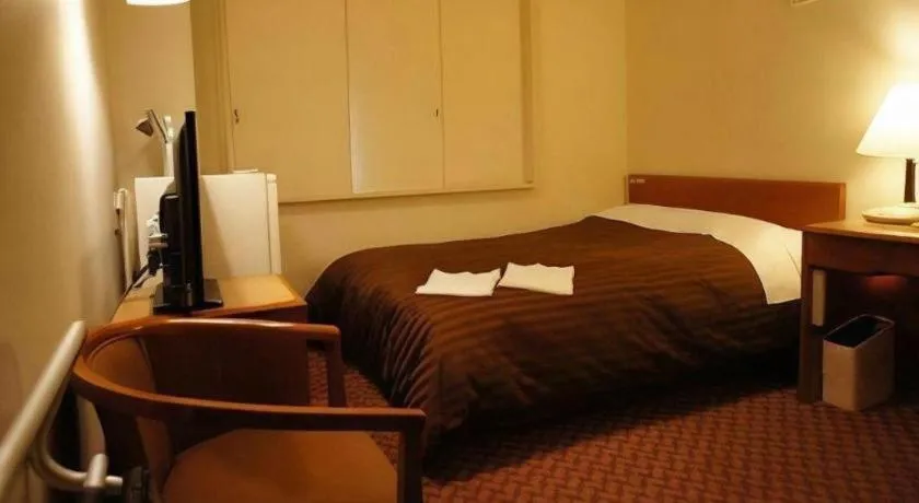 Bed in Mizue Dai-ichi Hotel