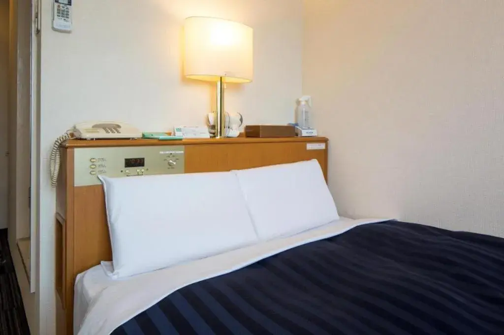 Bed in Kyoto Plaza Hotel Annex Bed in Kyoto Plaza Hotel Annex