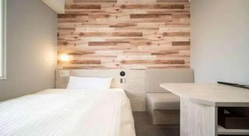 Bed in Super Hotel Hakodate Bed in Super Hotel Hakodate