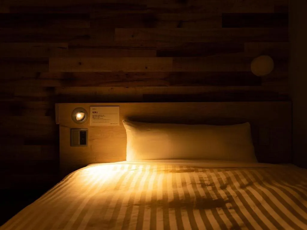 Bed in Super Hotel Hakodate