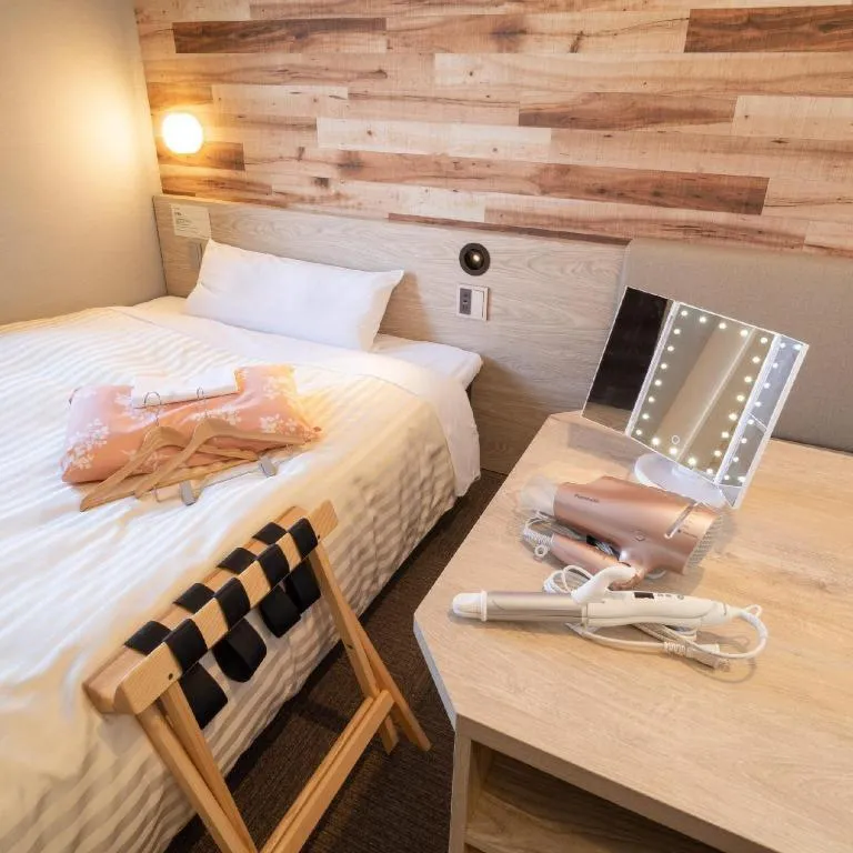 Bed in Super Hotel Hakodate