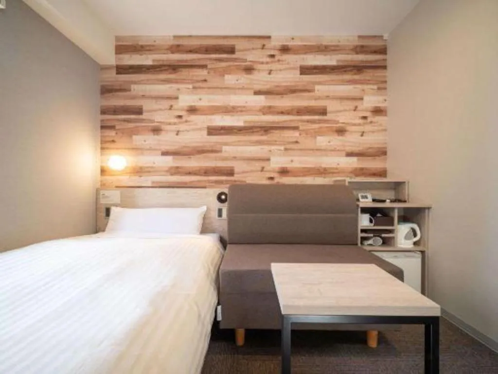 Bed in Super Hotel Hakodate