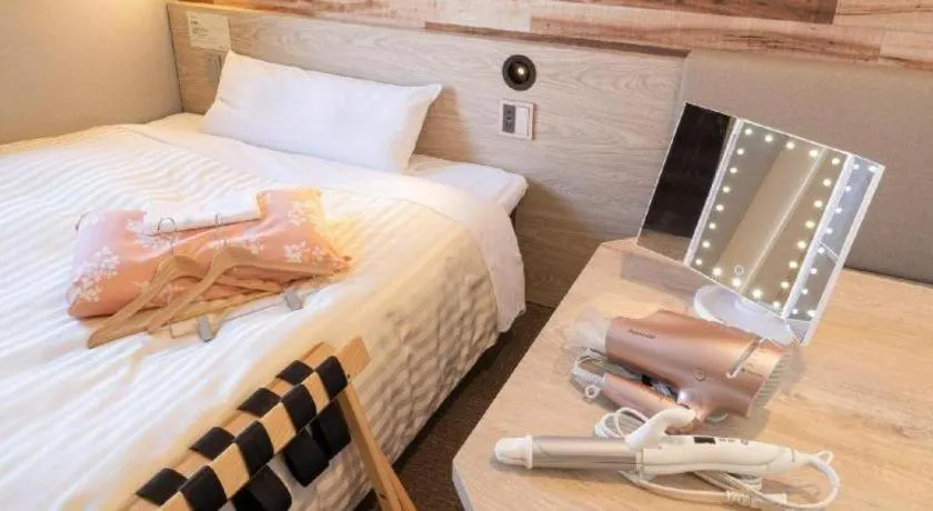 Bed in Super Hotel Hakodate
