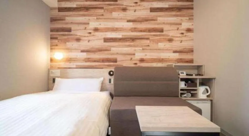 Bed in Super Hotel Hakodate