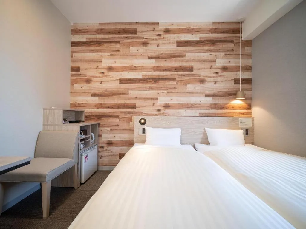 Bed in Super Hotel Hakodate