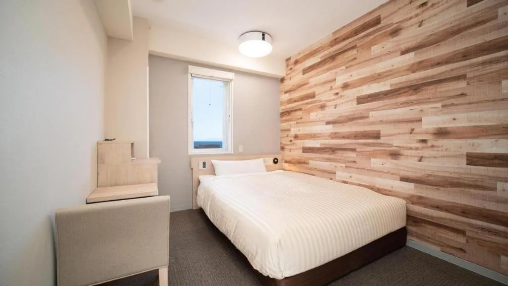 Bed in Super Hotel Hakodate