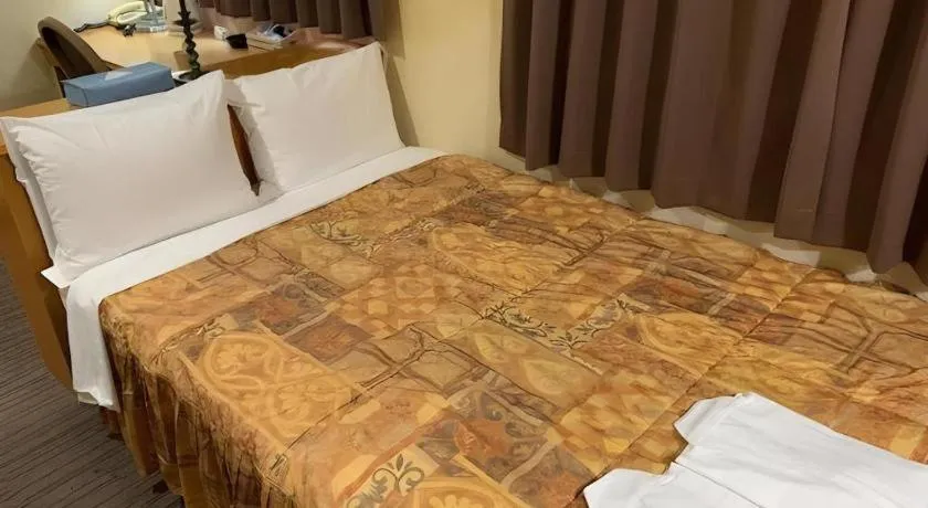 Bed in Shizuoka Daiichi Hotel
