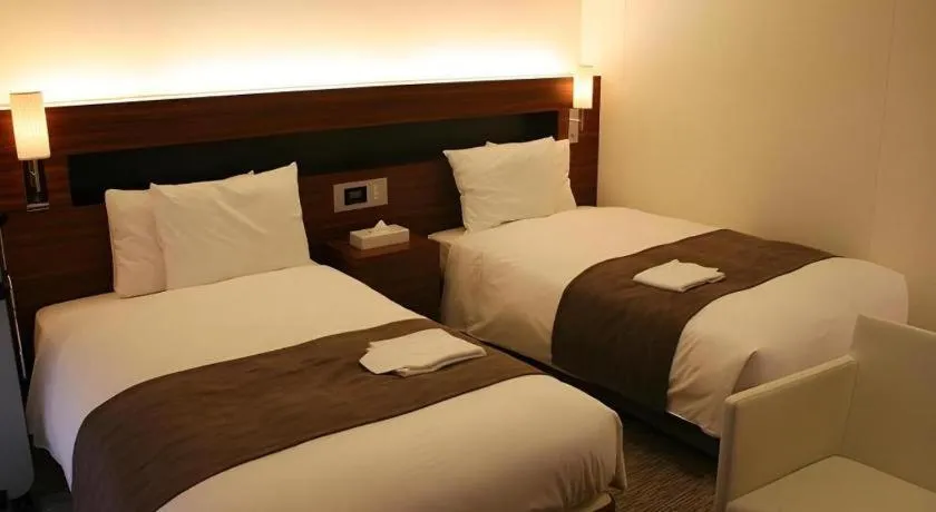 Bed in Shizuoka Daiichi Hotel