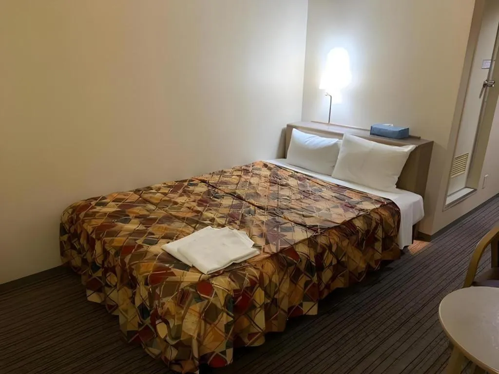 Bed in Shizuoka Daiichi Hotel