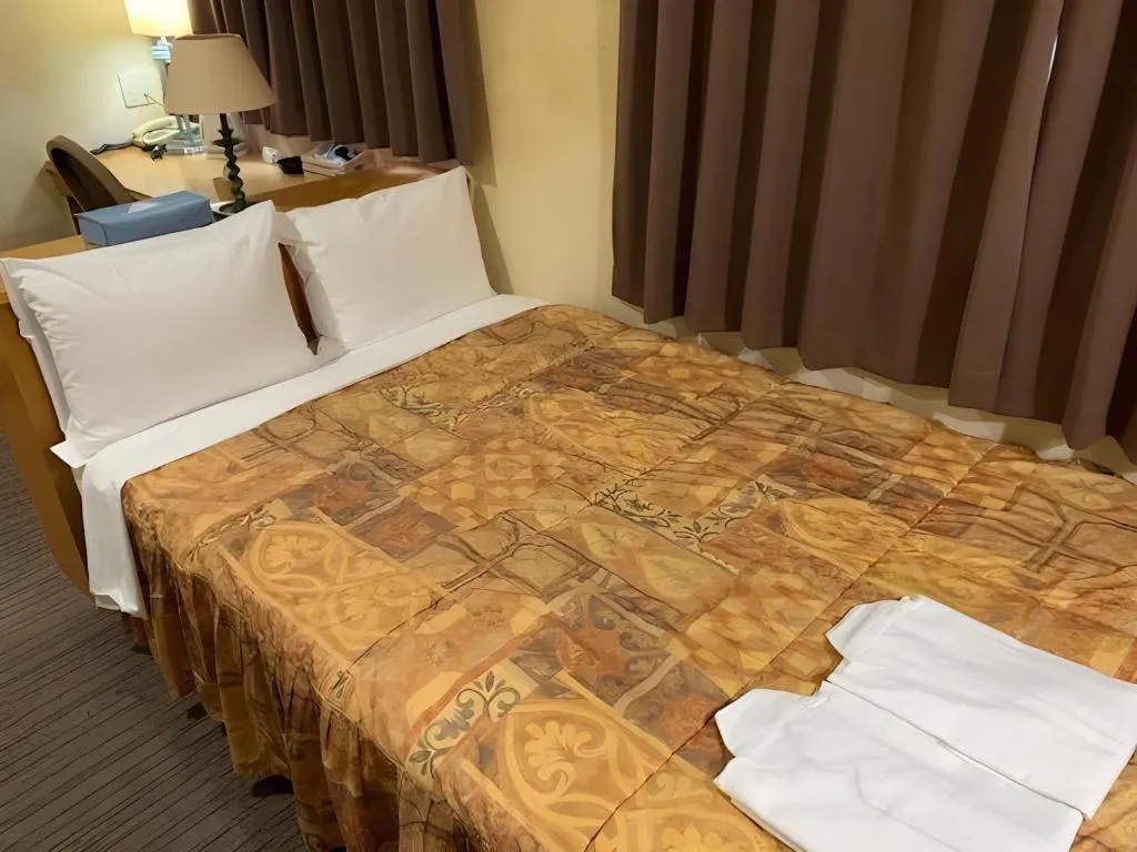 Bed in Shizuoka Daiichi Hotel