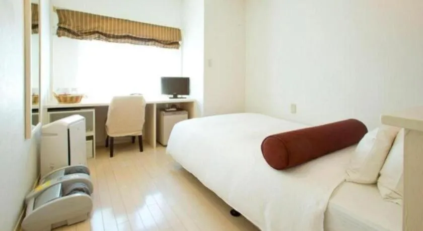 Bed in Hotel South Garden Hamamatsu