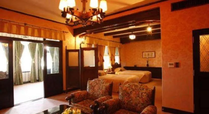 Bed in Unzen Kanko Hotel