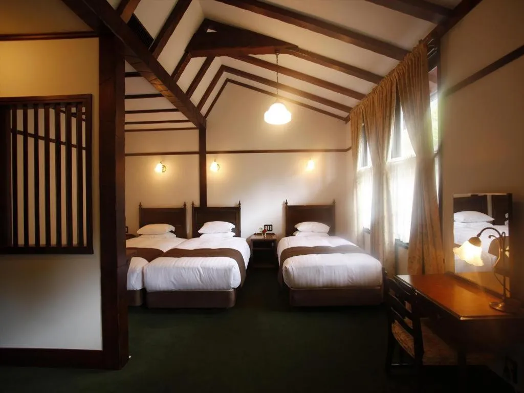 Bed in Unzen Kanko Hotel