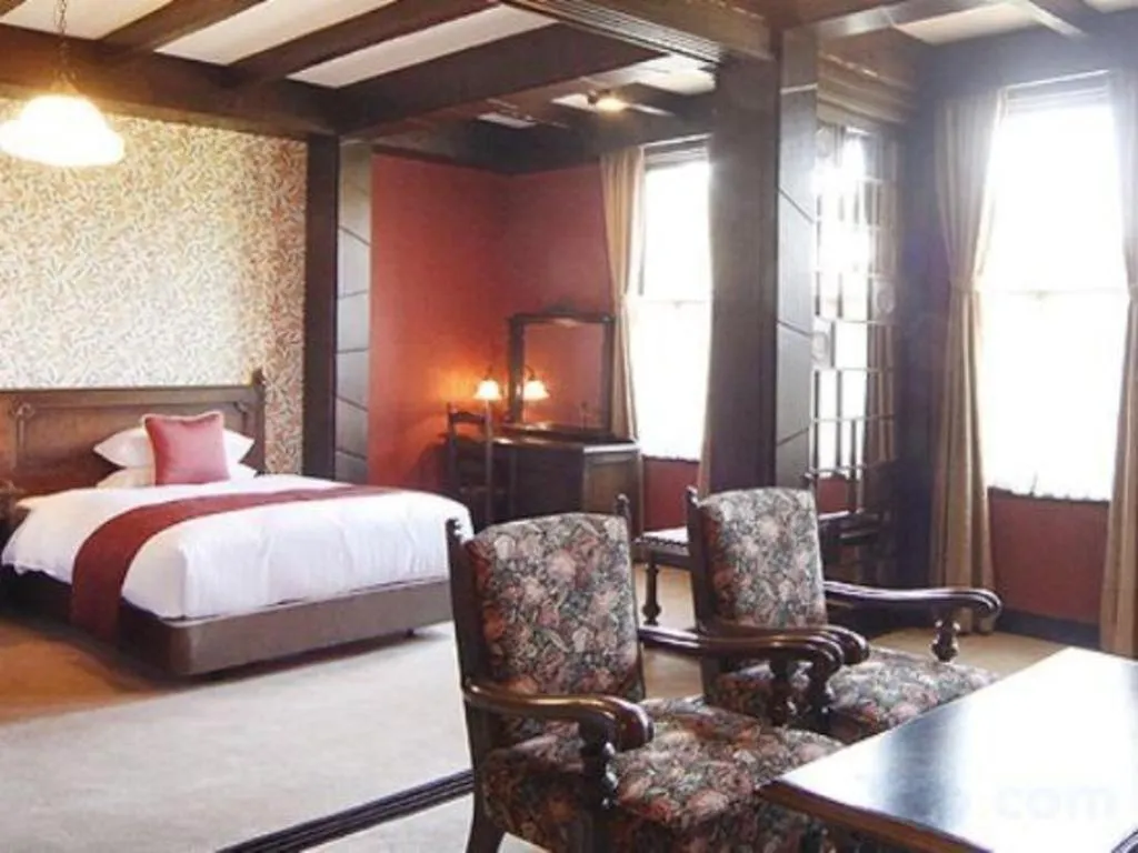 Bed in Unzen Kanko Hotel