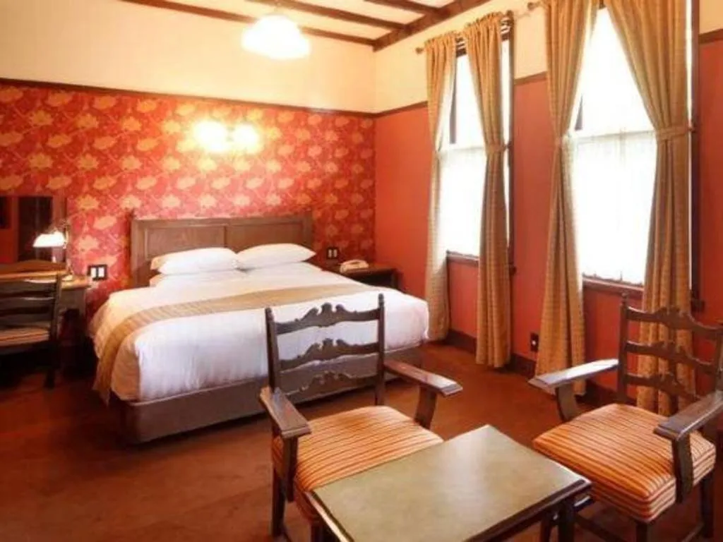 Bed in Unzen Kanko Hotel