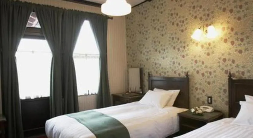 Bed in Unzen Kanko Hotel