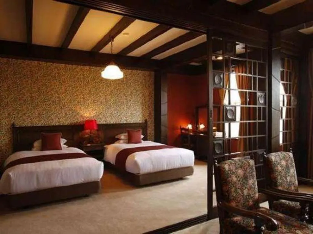 Bed in Unzen Kanko Hotel