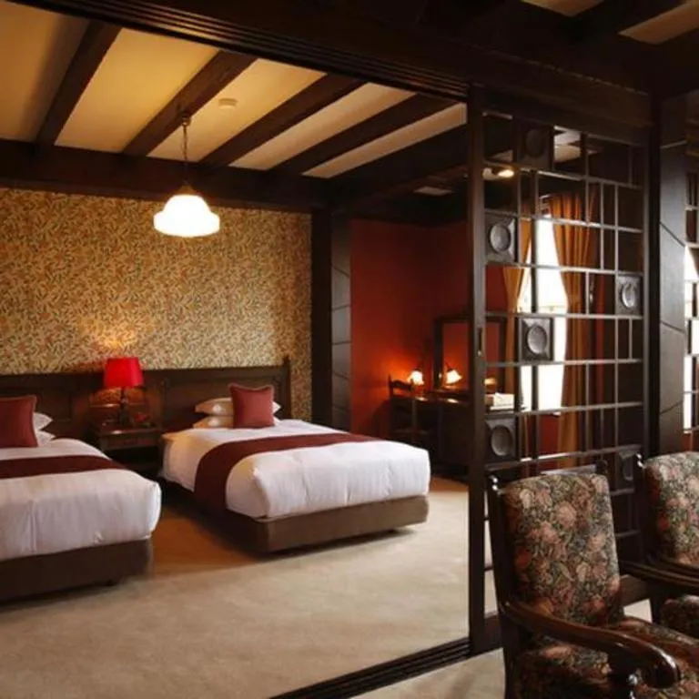 Bed in Unzen Kanko Hotel