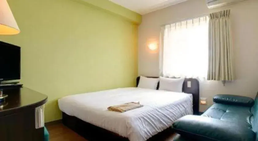 Bed in Hotel WBF Abianpana Ishigakijima Bed in Hotel WBF Abianpana Ishigakijima