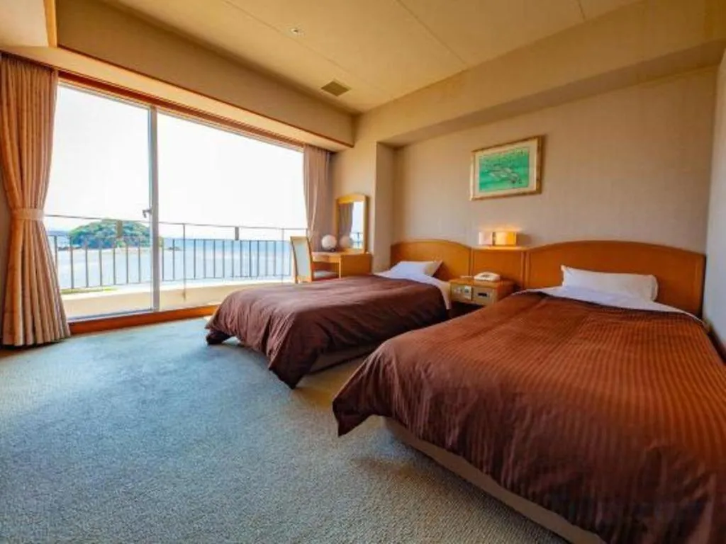 Bed in Hotel Takeshima