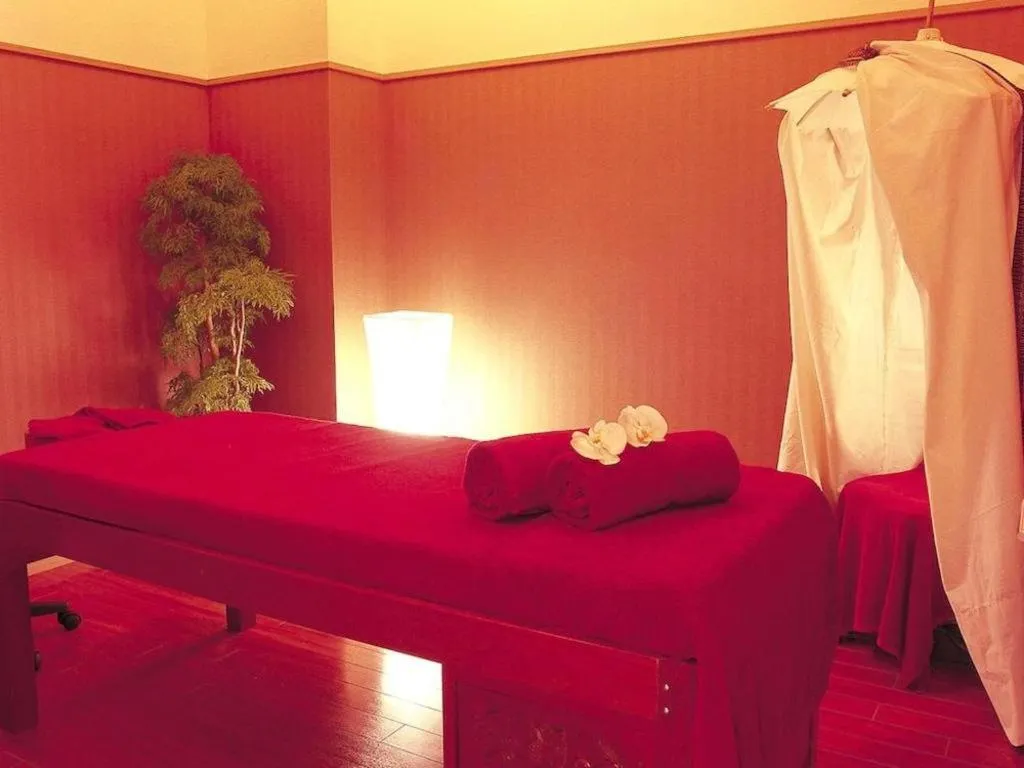 Bed in Hotel Takeshima