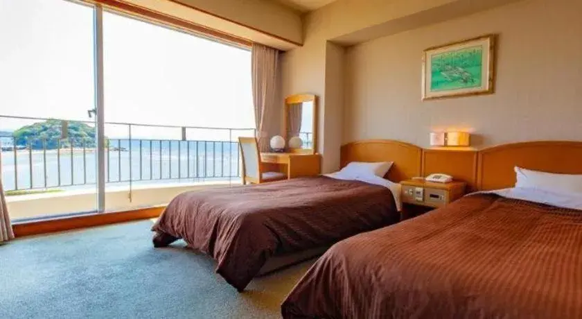 Bed in Hotel Takeshima Bed in Hotel Takeshima