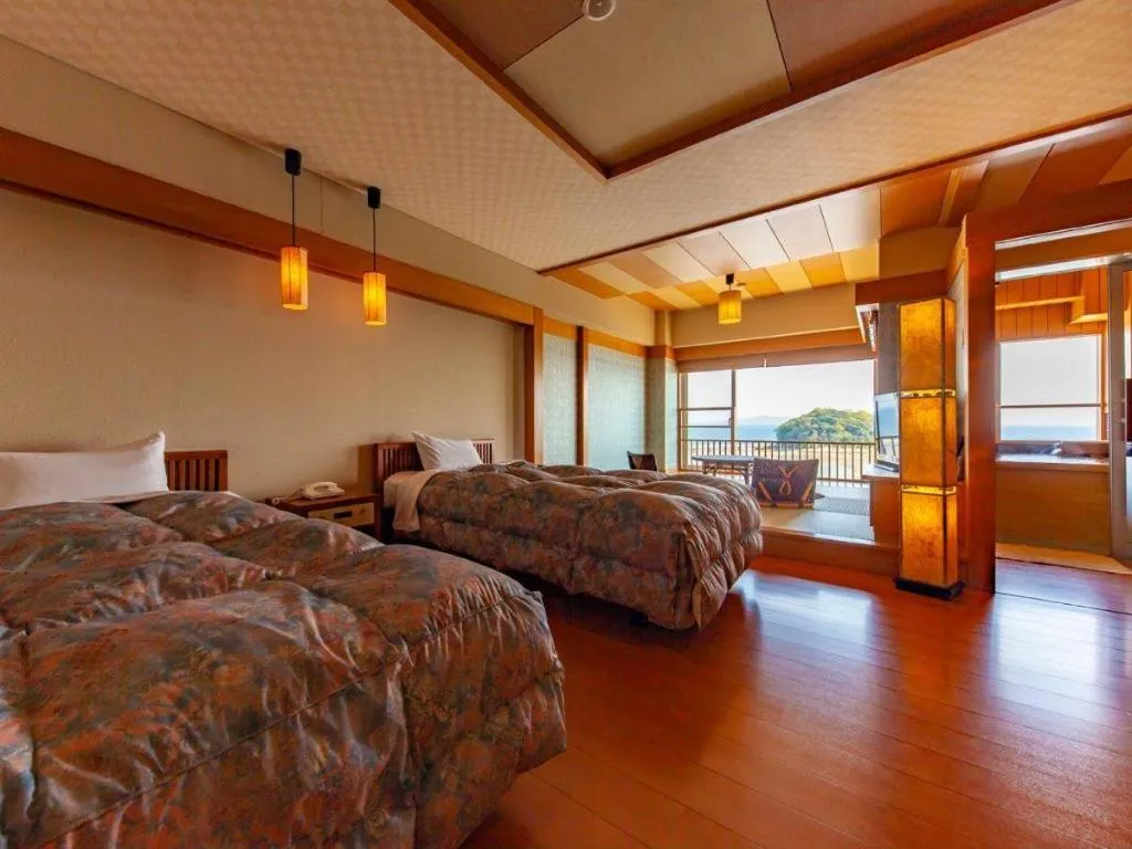 Bed in Hotel Takeshima