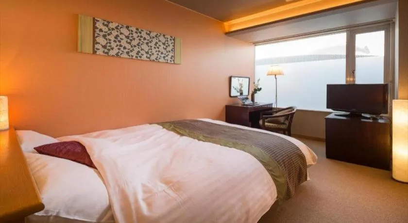 Bed in Hotel Matsumotoro