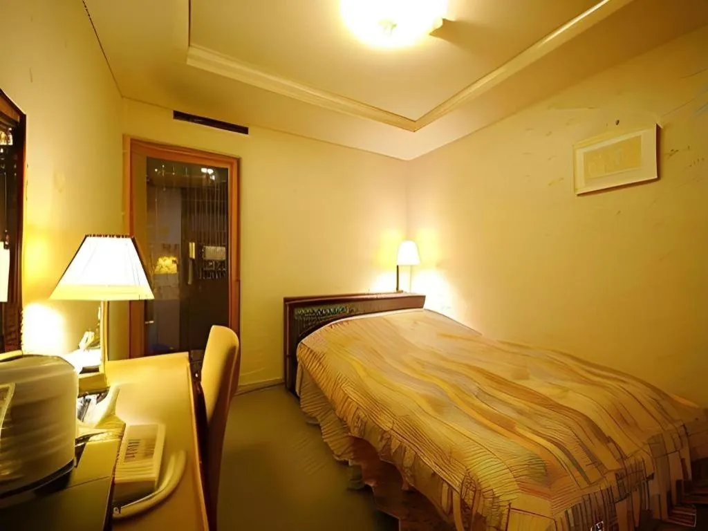 Bed in Hotel Fukui Castle