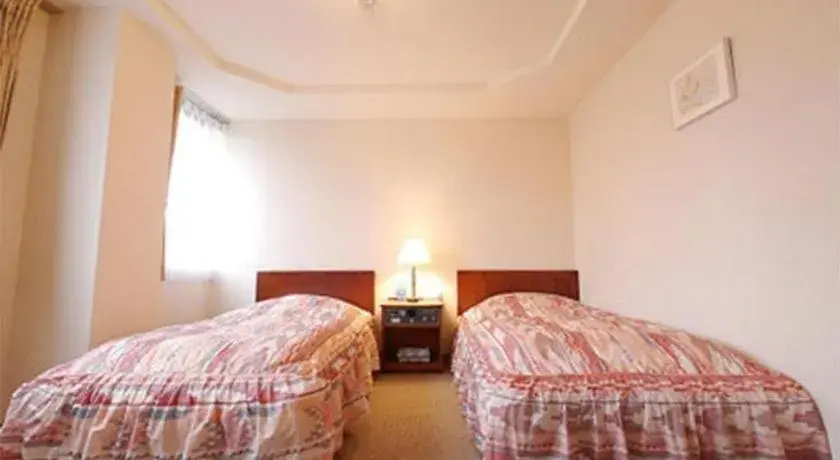 Bed in Hotel Fukui Castle Bed in Hotel Fukui Castle