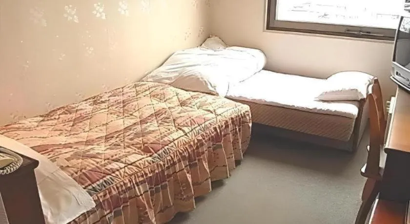 Bed in Hotel Fukui Castle